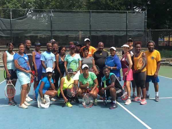 Picture Taken With Rackets in Hand