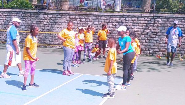 Small Group Playing Tennis