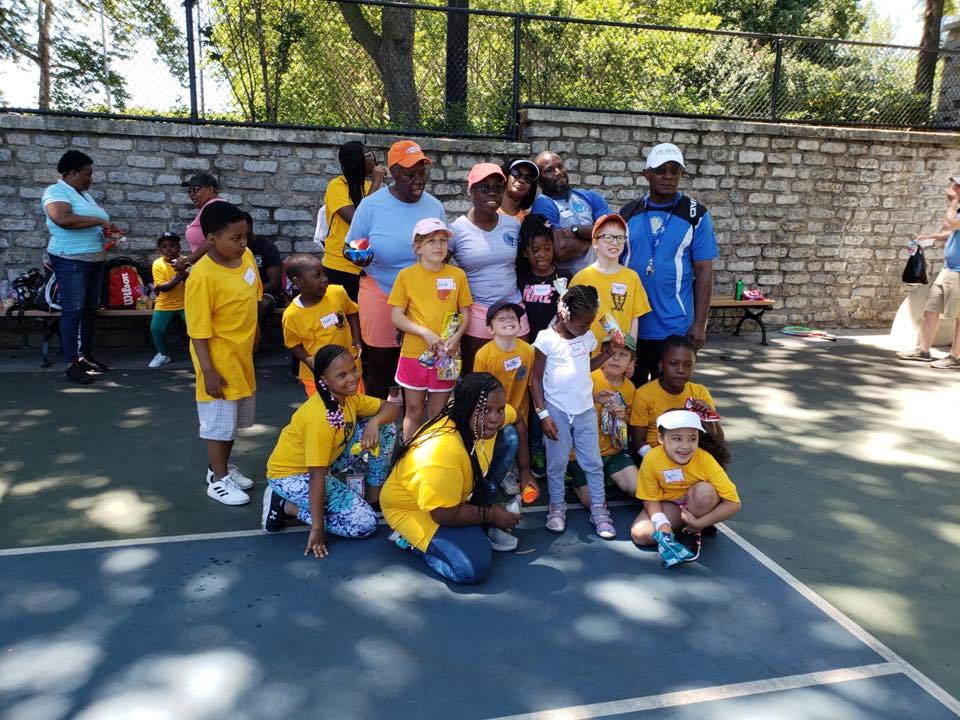 Group on Tennis Court